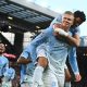 Jugadores del Manchester City celebran con Erling Haaland